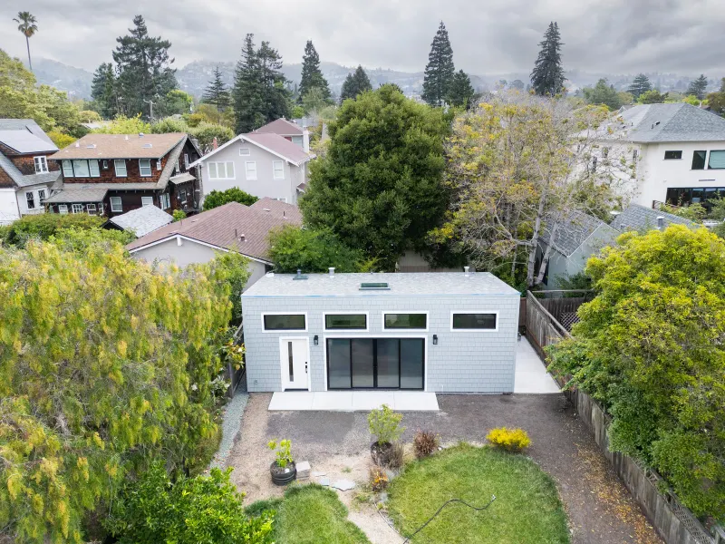 Aerial view of a detached backyard ADU with clerestory windows, built by Burton Builders in Berkeley